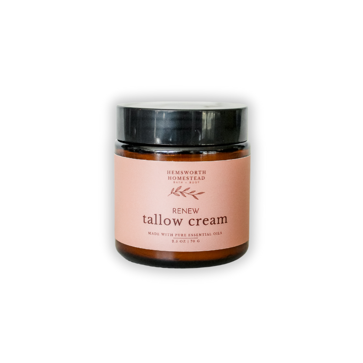 Amber glass jar of Renew Tallow Cream with a black lid and blush pink label, from Hemsworth Homestead