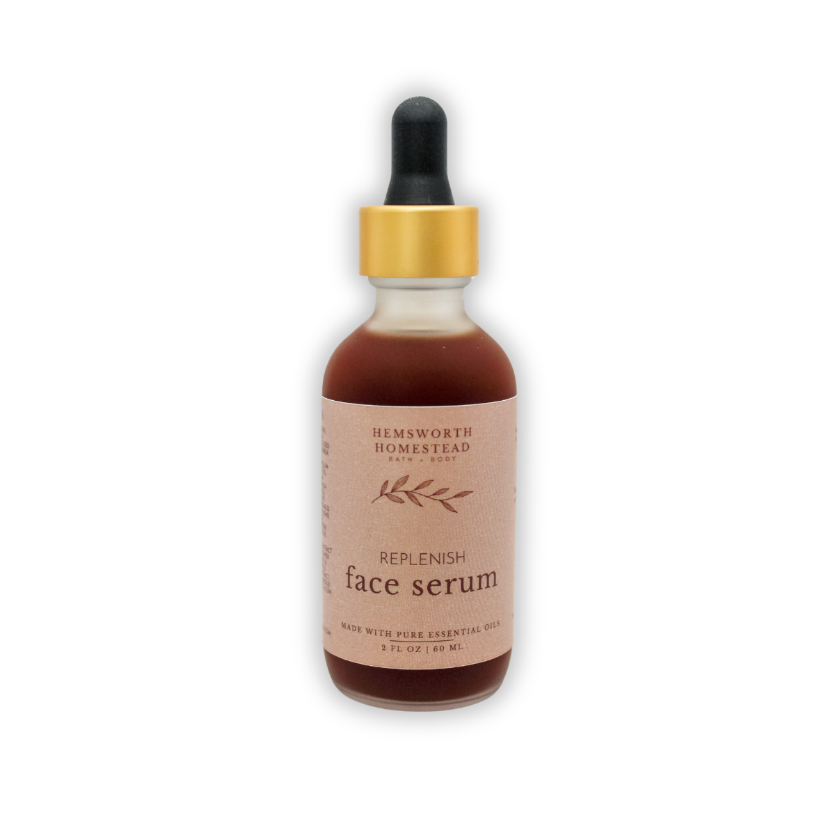 Replenish Face Serum in a frosted glass bottle with a gold collar and black dropper, deep amber oil inside